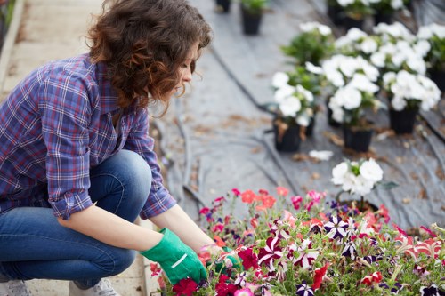 Team member preparing garden tools on site